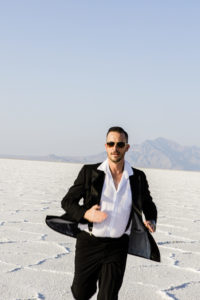 James Bond suiting on model on Salt Flats running