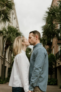 couple walking holding hands in Charleston, SC