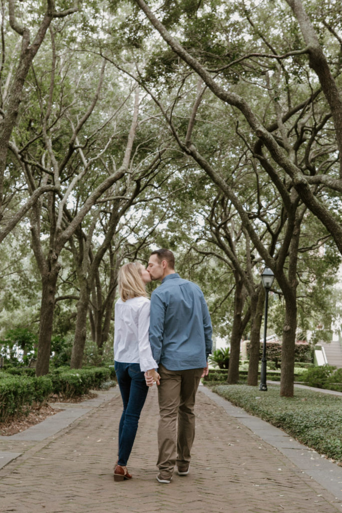 couple walking holding hands in Charleston, SC
