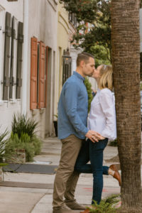 couple walking holding hands in Charleston, SC