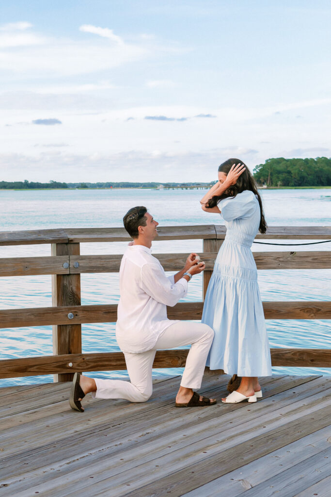 Marriage proposal photography at Harbour Town in Hilton Head with a violinist