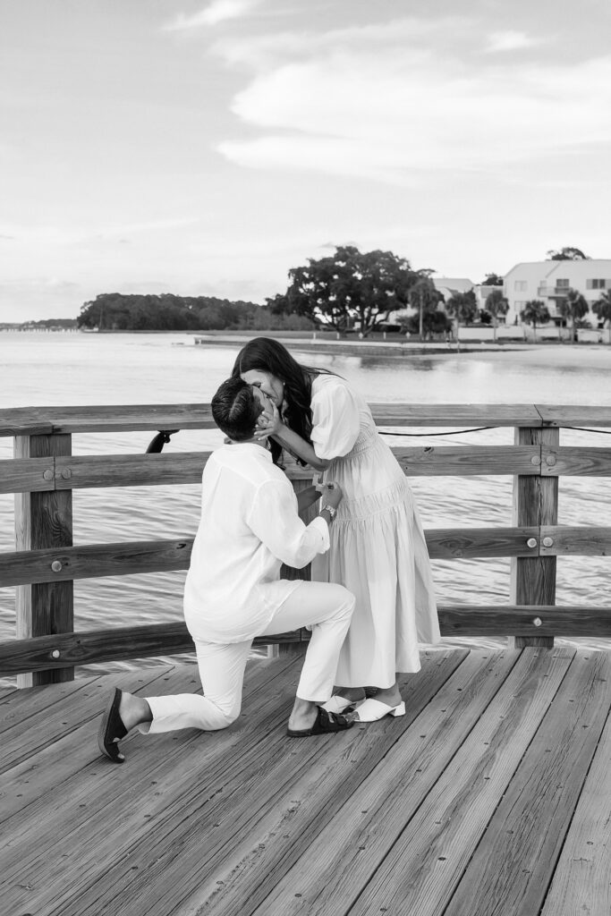 Marriage proposal photography at Harbour Town in Hilton Head with a violinist