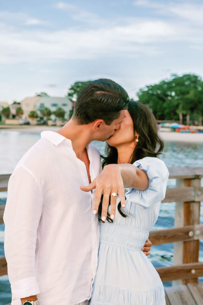 Marriage proposal photography at Harbour Town in Hilton Head with a violinist