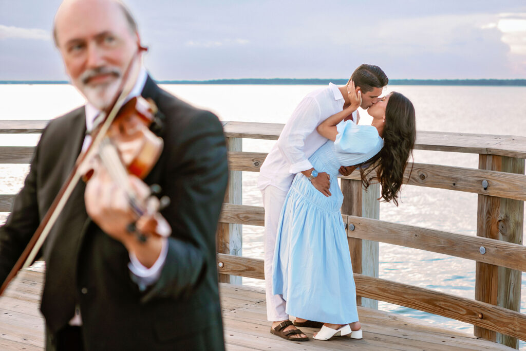 Marriage proposal photography at Harbour Town in Hilton Head with a violinist