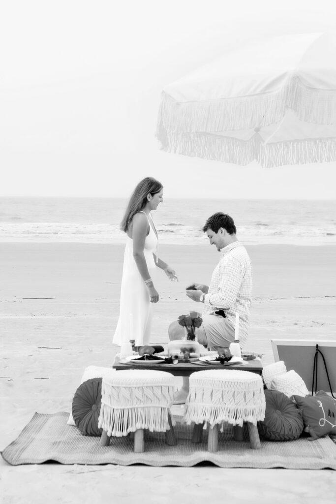 Marriage proposal on the beach in Hilton Head with a picnic set up