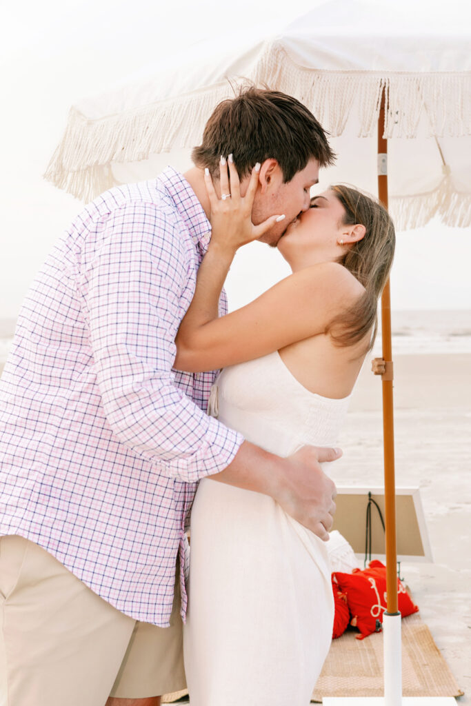 Marriage proposal on the beach in Hilton Head with a picnic set up