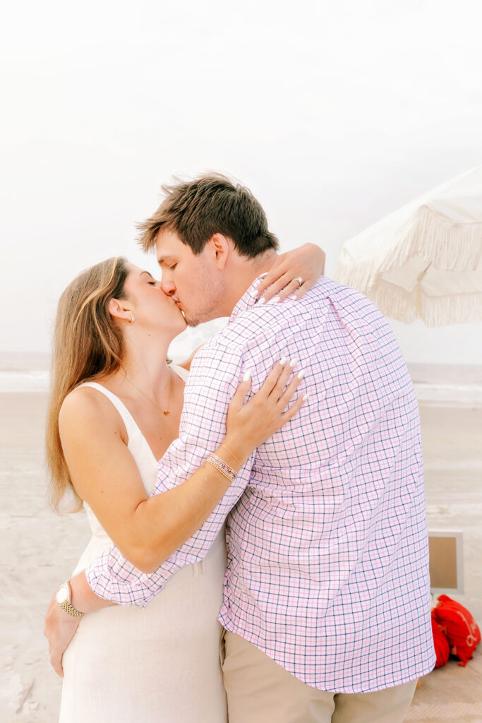 Marriage proposal on the beach in Hilton Head with a picnic set up