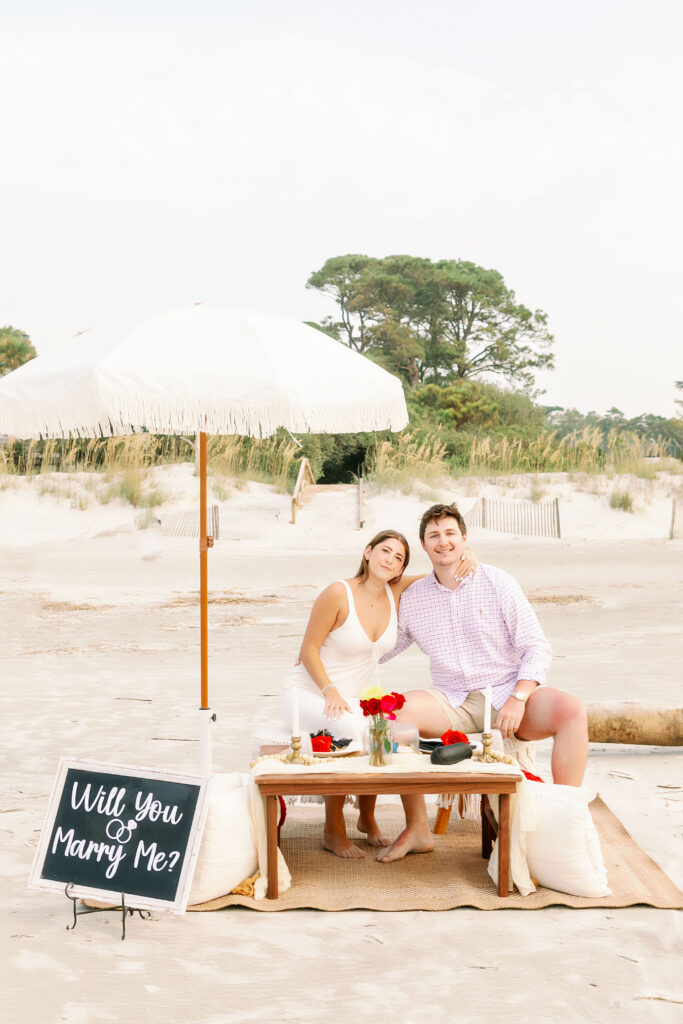 Marriage proposal on the beach in Hilton Head with a picnic set up