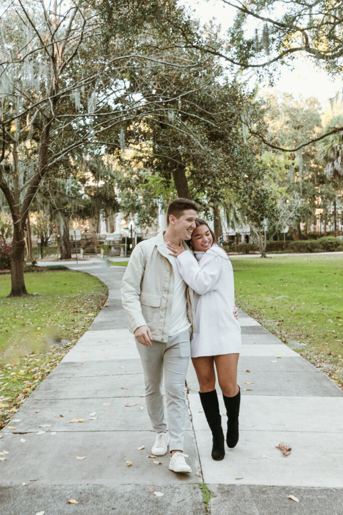 Marriage proposal capture by photographer Lisa Staff with picnic set up at Forsyth Park, Savannah