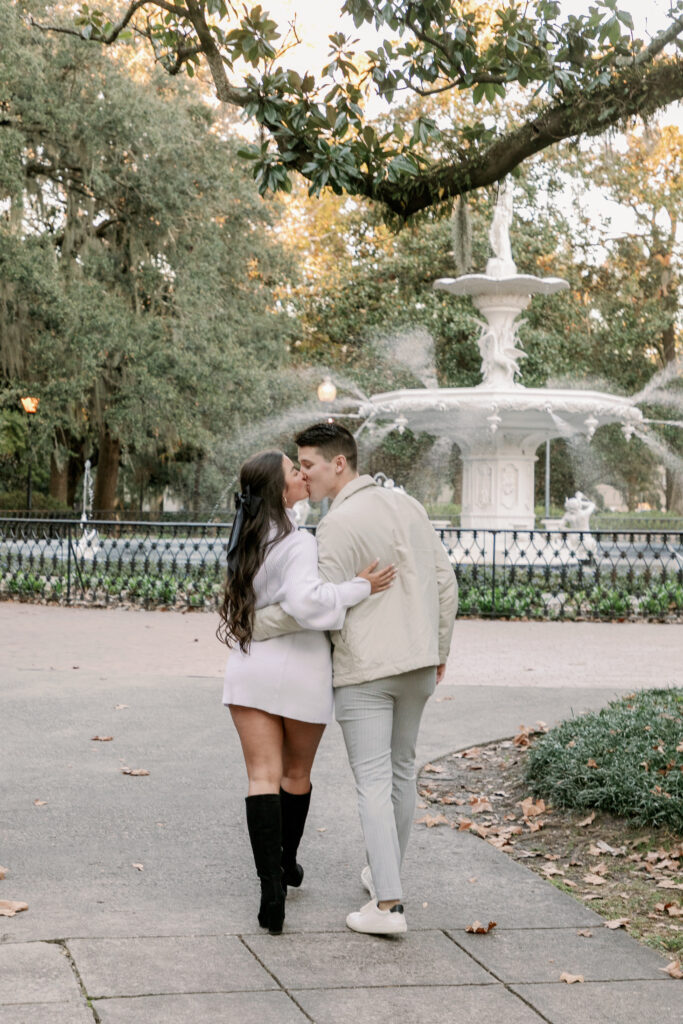 Marriage proposal capture by photographer Lisa Staff with picnic set up at Forsyth Park, Savannah