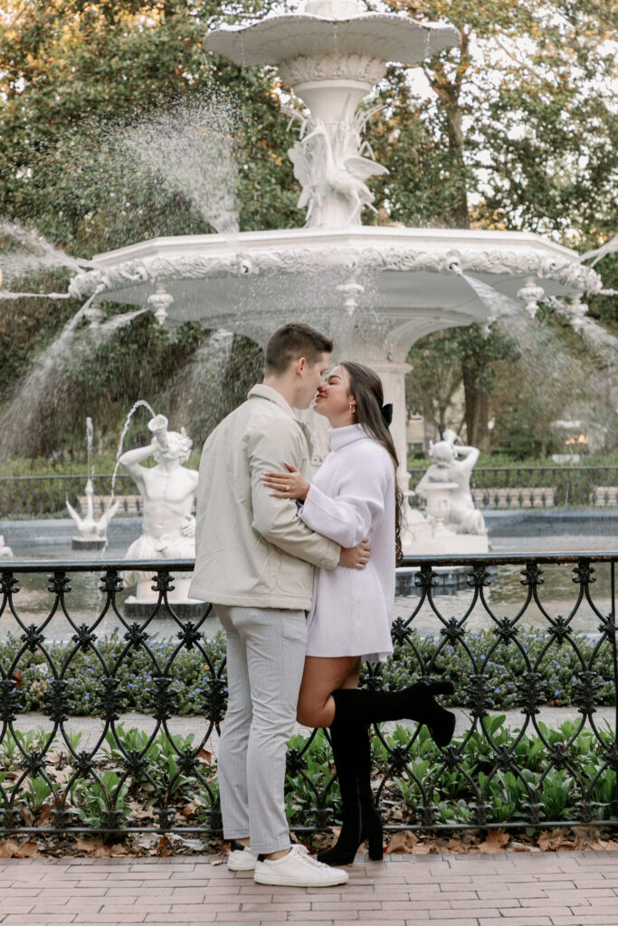 Marriage proposal capture by photographer Lisa Staff with picnic set up at Forsyth Park, Savannah