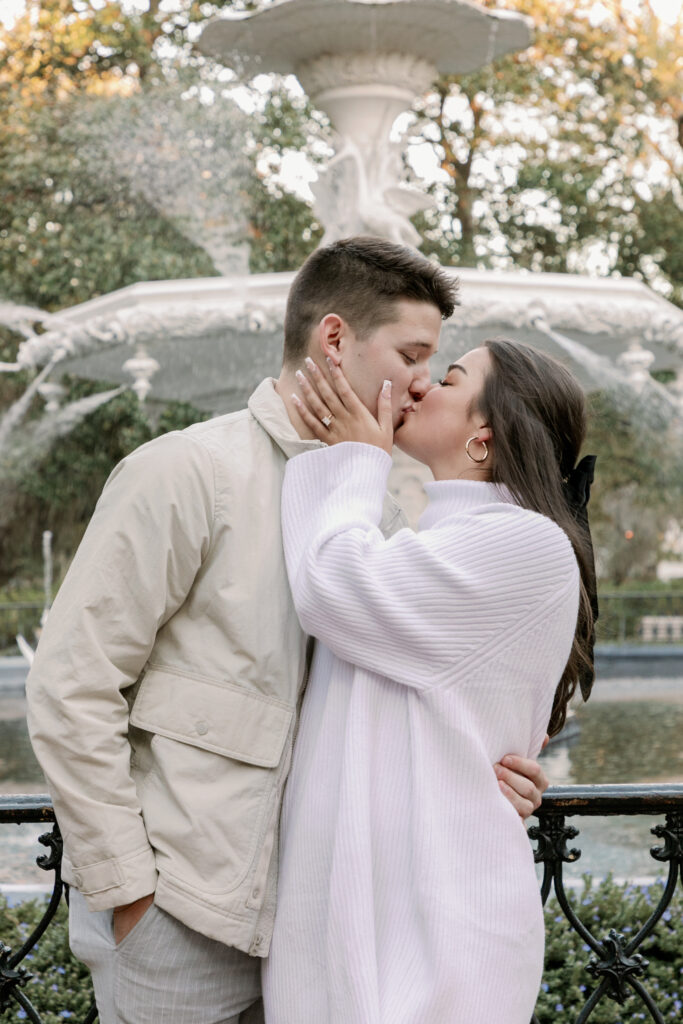 Marriage proposal capture by photographer Lisa Staff with picnic set up at Forsyth Park, Savannah