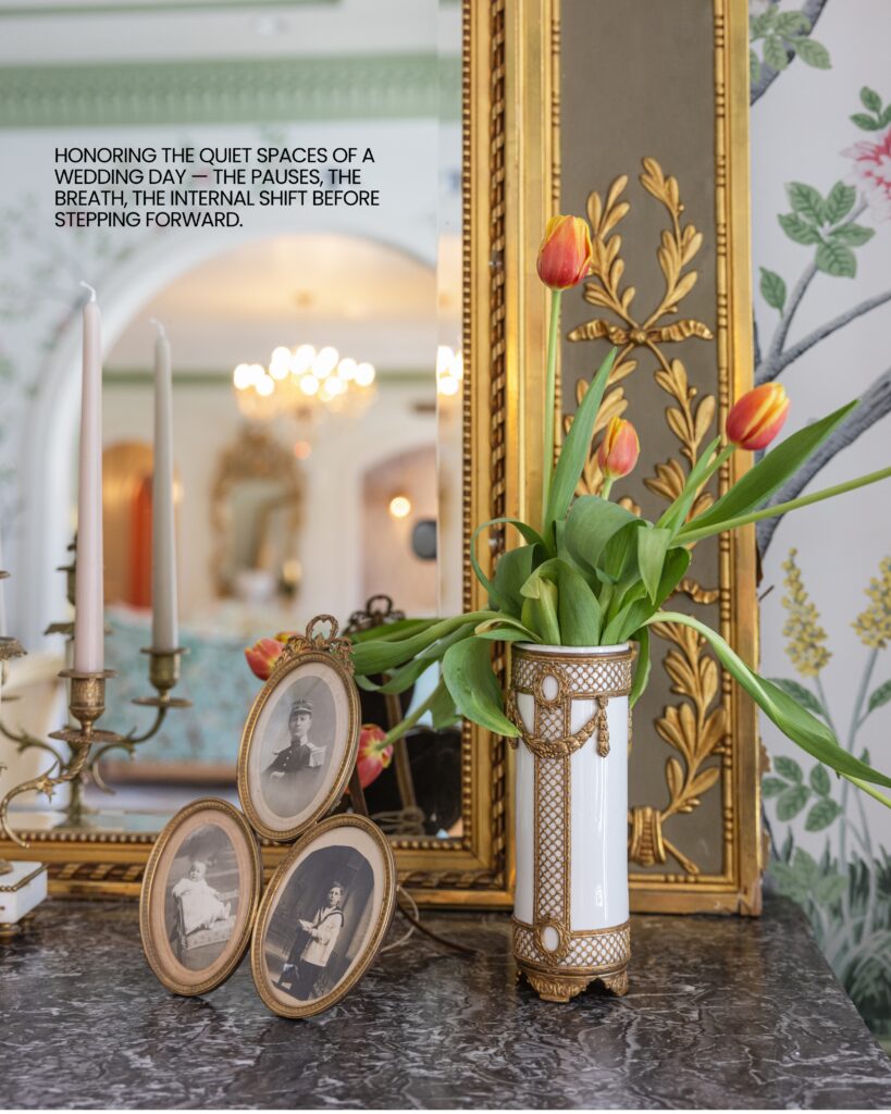 A bride getting ready at Hewitt Oaks surrounded by beautiful flowers and antique furniture