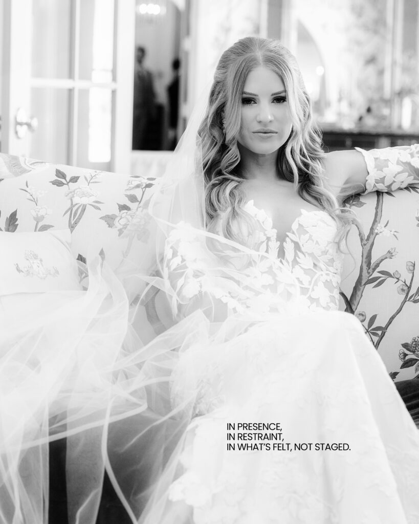  A bride looking in a gilded mirror at Hewitt Oaks