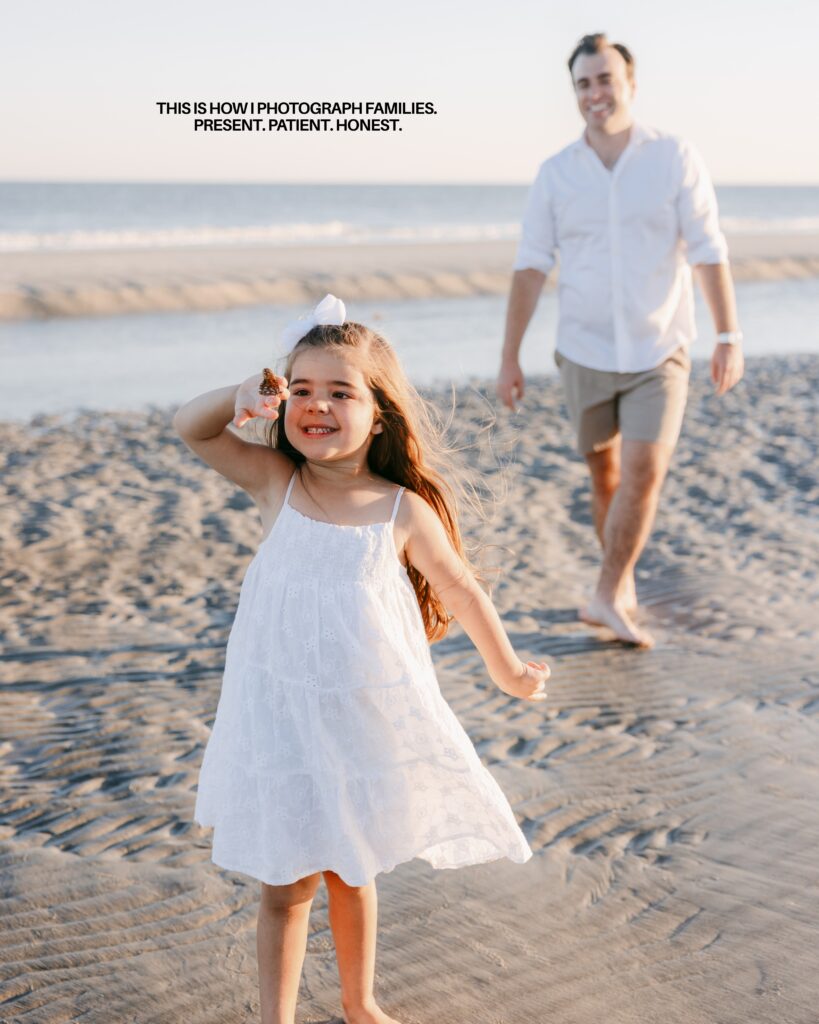 Family photography on the beach in Hilton Head with everyone dressed in cute white dresses running and playing on the beach with one little girl catching a butterfly
