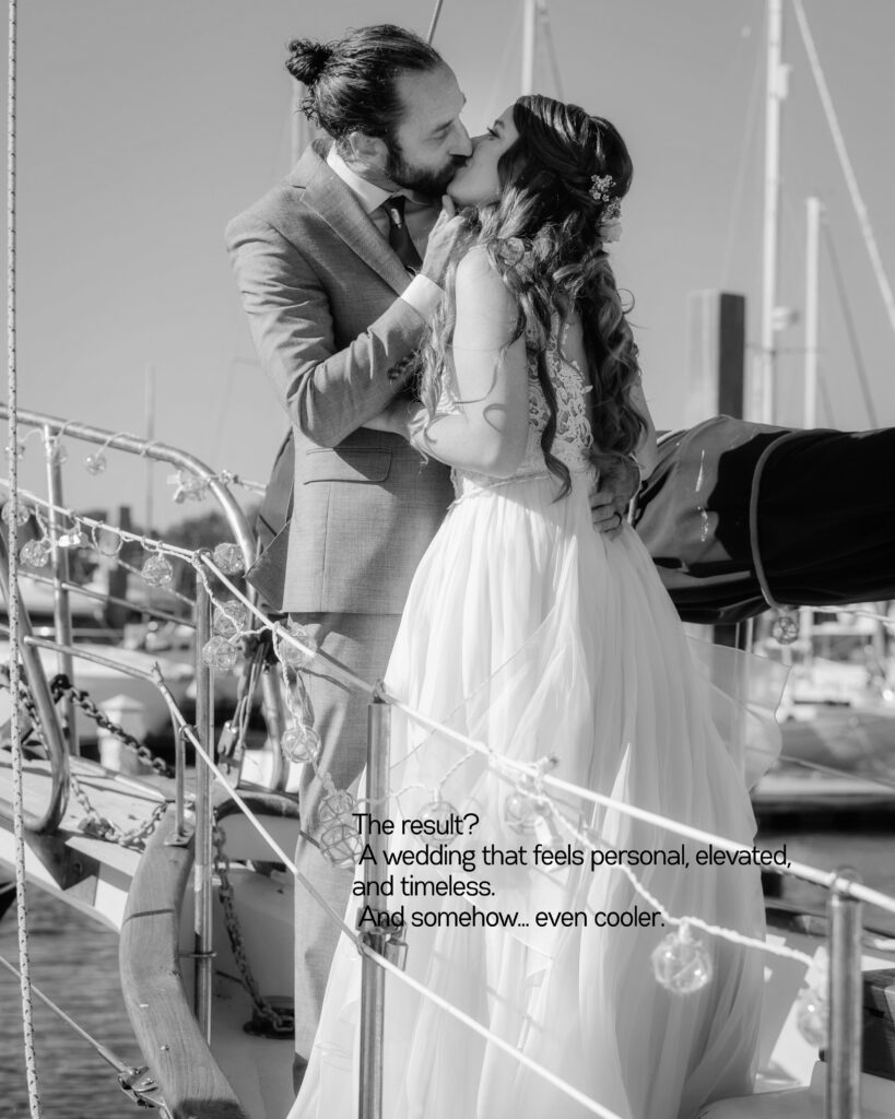 A bride and groom embracing on a sailboat in Beaufort, South Carolina
